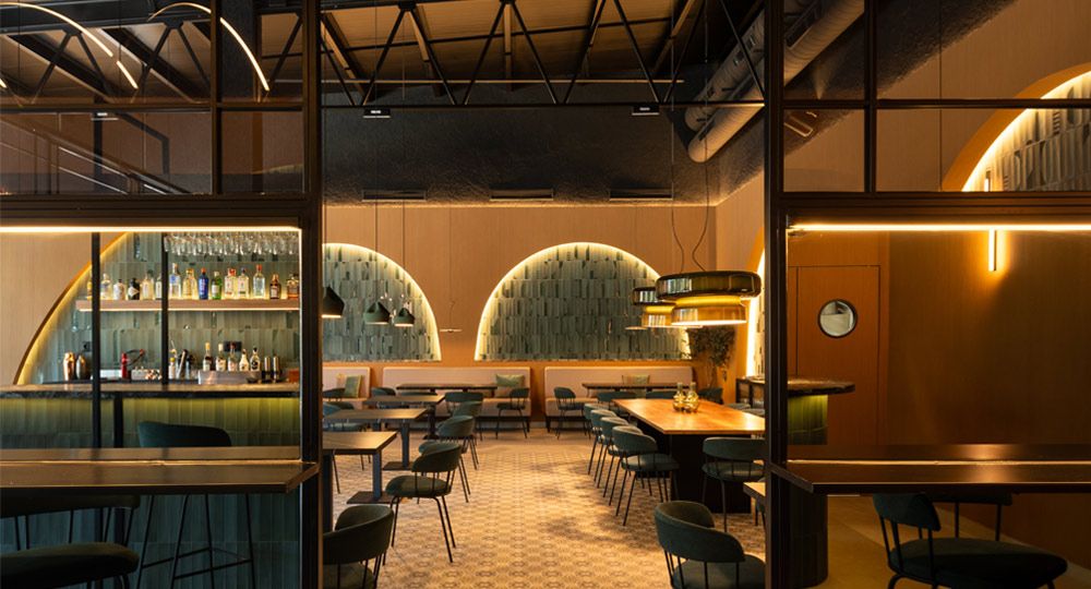 Ama, la Cocina de Amarga y Pica: Un homenaje a la tierra y al olivo a través del diseño