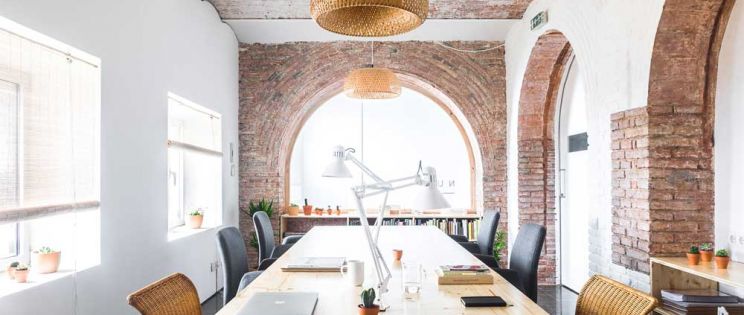 Transformación de un antiguo almacén en estudio, por Estudi NUA